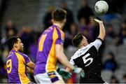 12 February 2022; Micéal Rooney of Kilcoo blocks a shot on goal by Craig Dias of Kilmacud Crokes, 9, out for a '45 during the AIB GAA Football All-Ireland Senior Club Championship Final match between Kilcoo, Down, and Kilmacud Crokes, Dublin, at Croke Park in Dublin. Photo by Piaras Ó Mídheach/Sportsfile