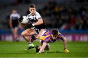 12 February 2022; Jerome Johnston of Kilcoo in action against Hugh Kenny of Kilmacud Crokes during the AIB GAA Football All-Ireland Senior Club Championship Final match between Kilcoo, Down, and Kilmacud Crokes, Dublin, at Croke Park in Dublin. Photo by Stephen McCarthy/Sportsfile