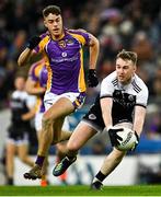 12 February 2022; Paul Devlin of Kilcoo in action against Conor Casey of Kilmacud Crokes during the AIB GAA Football All-Ireland Senior Club Championship Final match between Kilcoo, Down, and Kilmacud Crokes, Dublin, at Croke Park in Dublin. Photo by Piaras Ó Mídheach/Sportsfile