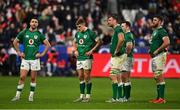 12 February 2022; Ireland players, from left, Conor Murray, Garry Ringrose, Tadhg Beirne, Cian Healy and Caelan Doris reacts after their side's defeat in the Guinness Six Nations Rugby Championship match between France and Ireland at Stade de France in Paris, France.  Photo by Seb Daly/Sportsfile