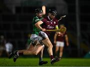 12 February 2022; Joseph Cooney of Galway in action against Ronan Connolly of Limerick during the Allianz Hurling League Division 1 Group A match between Limerick and Galway at TUS Gaelic Grounds in Limerick. Photo by Eóin Noonan/Sportsfile