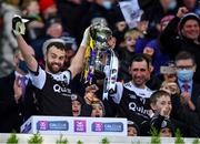 12 February 2022; Kilcoo joint-captains Conor Laverty, left, and Aidan Branagan lift the Andy Merrigan cup after the AIB GAA Football All-Ireland Senior Club Championship Final match between Kilcoo, Down, and Kilmacud Crokes, Dublin, at Croke Park in Dublin. Photo by Piaras Ó Mídheach/Sportsfile