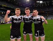 12 February 2022; Kilcoo players, from left, Aaron Morgan, Callum Rogers, and Daryl Branagan celebrate after their side's victory in the AIB GAA Football All-Ireland Senior Club Championship Final match between Kilcoo, Down, and Kilmacud Crokes, Dublin, at Croke Park in Dublin. Photo by Piaras Ó Mídheach/Sportsfile