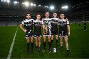 12 February 2022; Kilcoo players, from left, Niall Branagan, Aaron Branagan, Aidan Branagan, Eugene Branagan and Daryl Branagan celebrate with the Andy Merrigan cup after the AIB GAA Football All-Ireland Senior Club Championship Final match between Kilcoo, Down, and Kilmacud Crokes, Dublin, at Croke Park in Dublin. Photo by Stephen McCarthy/Sportsfile