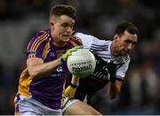 12 February 2022; Cian O'Connor of Kilmacud Crokes in action against Aidan Branagan of Kilcoo during the AIB GAA Football All-Ireland Senior Club Championship Final match between Kilcoo, Down, and Kilmacud Crokes, Dublin, at Croke Park in Dublin. Photo by Piaras Ó Mídheach/Sportsfile