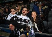 12 February 2022; Niall Branagan of Kilcoo with wife Martine and son Charlie and the Andy Merrigan cup following the AIB GAA Football All-Ireland Senior Club Championship Final match between Kilcoo, Down, and Kilmacud Crokes, Dublin, at Croke Park in Dublin. Photo by Stephen McCarthy/Sportsfile