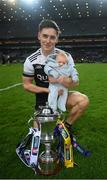 12 February 2022; Aaron Branagan of Kilcoo with his 6-week-old son Leo and the Andy Merrigan cup after the AIB GAA Football All-Ireland Senior Club Championship Final match between Kilcoo, Down, and Kilmacud Crokes, Dublin, at Croke Park in Dublin. Photo by Stephen McCarthy/Sportsfile