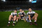 12 February 2022; Kilcoo players, from left, Shealin Johnston, Jerome Johnston and his 5-month-old son Lar, and Ryan Johnston celebrate with the Andy Merrigan cup after the AIB GAA Football All-Ireland Senior Club Championship Final match between Kilcoo, Down, and Kilmacud Crokes, Dublin, at Croke Park in Dublin. Photo by Stephen McCarthy/Sportsfile