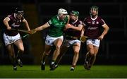 12 February 2022; Kyle Hayes of Limerick in action against Cathal Mannion, right, and Joseph Cooney of Galway during the Allianz Hurling League Division 1 Group A match between Limerick and Galway at TUS Gaelic Grounds in Limerick. Photo by Eóin Noonan/Sportsfile