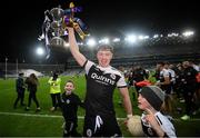 12 February 2022; Ryan McEvoy of Kilcoo celebrates with the Andy Merrigan cup after the AIB GAA Football All-Ireland Senior Club Championship Final match between Kilcoo, Down, and Kilmacud Crokes, Dublin, at Croke Park in Dublin. Photo by Stephen McCarthy/Sportsfile