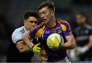 12 February 2022; Hugh Kenny of Kilmacud Crokes in action against Aaron Branagan of Kilcoo during the AIB GAA Football All-Ireland Senior Club Championship Final match between Kilcoo, Down, and Kilmacud Crokes, Dublin, at Croke Park in Dublin. Photo by Piaras Ó Mídheach/Sportsfile