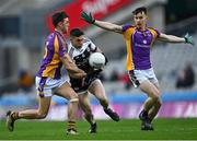 12 February 2022; Daryl Branagan of Kilcoo in action against Andrew McGowan, left, and Dara Mullen of Kilmacud Crokes during the AIB GAA Football All-Ireland Senior Club Championship Final match between Kilcoo, Down, and Kilmacud Crokes, Dublin, at Croke Park in Dublin. Photo by Piaras Ó Mídheach/Sportsfile