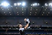 12 February 2022; Jerome Johnston of Kilcoo celebrates with his 5-month-old son Lar after the AIB GAA Football All-Ireland Senior Club Championship Final match between Kilcoo, Down, and Kilmacud Crokes, Dublin, at Croke Park in Dublin. Photo by Stephen McCarthy/Sportsfile