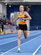 12 February 2022; Michelle Finn of Leevale AC, Cork, crosses the line to win the women's 3000m during the AAI National Indoor Games & Indoor League Final at the National Indoor Arena, Sport Ireland Campus in Dublin. Photo by Sam Barnes/Sportsfile