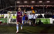 11 February 2022; Drogheda United captain Dane Massey leads his side out before the Jim Malone Cup match between Dundalk and Drogheda United at Oriel Park in Dundalk, Louth. Photo by Ben McShane/Sportsfile