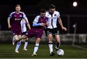 11 February 2022; Robbie Benson of Dundalk and Dylan Grimes of Drogheda United during the Jim Malone Cup match between Dundalk and Drogheda United at Oriel Park in Dundalk, Louth. Photo by Ben McShane/Sportsfile