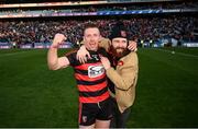 12 February 2022; Ian Kenny of Ballygunner and supporter Dean McGarry celebrates after the AIB GAA Hurling All-Ireland Senior Club Championship Final match between Ballygunner, Waterford, and Shamrocks, Kilkenny, at Croke Park in Dublin. Photo by Stephen McCarthy/Sportsfile