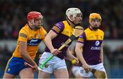 13 February 2022; Liam Ryan of Wexford in action against Domhnall McMahon of Clare during the Allianz Hurling League Division 1 Group A match between Clare and Wexford at Cusack Park in Ennis, Clare. Photo by Diarmuid Greene/Sportsfile