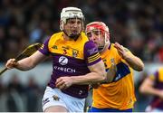 13 February 2022; Liam Ryan of Wexford in action against Domhnall McMahon of Clare during the Allianz Hurling League Division 1 Group A match between Clare and Wexford at Cusack Park in Ennis, Clare. Photo by Diarmuid Greene/Sportsfile