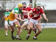 13 February 2022; Killian Sampson of Offaly in action against Mark Keane of Cork during the Allianz Hurling League Division 1 Group A match between Offaly and Cork at St. Brendan's Park in Birr, Offaly. Photo by Michael P Ryan/Sportsfile