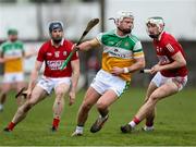 13 February 2022; Paddy Delaney of Offaly in action against Conor Lehane, left, and Mark Keane of Cork during the Allianz Hurling League Division 1 Group A match between Offaly and Cork at St. Brendan's Park in Birr, Offaly. Photo by Michael P Ryan/Sportsfile
