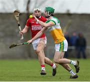 13 February 2022; Ben Conneely of Offaly in action against Mark Keane of Cork during the Allianz Hurling League Division 1 Group A match between Offaly and Cork at St. Brendan's Park in Birr, Offaly. Photo by Michael P Ryan/Sportsfile