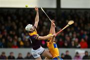 13 February 2022; Oisín Foley of Wexford in action against Rory Hanes of Clare during the Allianz Hurling League Division 1 Group A match between Clare and Wexford at Cusack Park in Ennis, Clare. Photo by Diarmuid Greene/Sportsfile