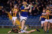 13 February 2022; Jake Morris of Tipperary has a shot on goal despite the efforts of Mikey Butler of Kilkenny during the Allianz Hurling League Division 1 Group B match between Tipperary and Kilkenny at FBD Semple Stadium in Thurles, Tipperary. Photo by Brendan Moran/Sportsfile