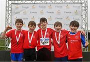 13 February 2022; The St Cronans AC team, from left, Daithi Ryan, Cathal Ryan, Oran Dignan, Oisin Ninahan and Max Garvey, celebrate with their medals after winning the boy's under 12 relay at The Irish Life Health National Intermediate, Master, Juvenile B & Relays Cross Country Championships in Castlelyons, Cork. Photo by Sam Barnes/Sportsfile