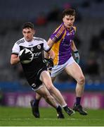 12 February 2022; Daryl Branagan of Kilcoo in action against Dara Mullen of Kilmacud Crokes during the AIB GAA Football All-Ireland Senior Club Championship Final match between Kilcoo, Down, and Kilmacud Crokes, Dublin, at Croke Park in Dublin. Photo by Stephen McCarthy/Sportsfile