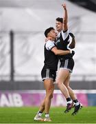 12 February 2022; Kilcoo players Anthony Morgan, right, and Dylan Ward celebrate at the final whistle of their victory in the AIB GAA Football All-Ireland Senior Club Championship Final match between Kilcoo, Down, and Kilmacud Crokes, Dublin, at Croke Park in Dublin. Photo by Piaras Ó Mídheach/Sportsfile