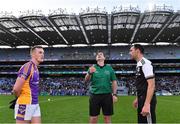 12 February 2022; Referee Seán Hurson performs the coin toss with Kilmacud Crokes captain Shane Cunningham and Kilcoo joint-captain Aidan Branagan before the AIB GAA Football All-Ireland Senior Club Championship Final match between Kilcoo, Down, and Kilmacud Crokes, Dublin, at Croke Park in Dublin. Photo by Piaras Ó Mídheach/Sportsfile