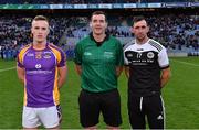 12 February 2022; Referee Seán Hurson with Kilmacud Crokes captain Shane Cunningham and Kilcoo joint-captain Aidan Branagan before the AIB GAA Football All-Ireland Senior Club Championship Final match between Kilcoo, Down, and Kilmacud Crokes, Dublin, at Croke Park in Dublin. Photo by Piaras Ó Mídheach/Sportsfile