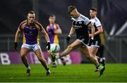 12 February 2022; Jerome Johnston of Kilcoo in action against Shane Cunningham of Kilmacud Crokes during the AIB GAA Football All-Ireland Senior Club Championship Final match between Kilcoo, Down, and Kilmacud Crokes, Dublin, at Croke Park in Dublin. Photo by Piaras Ó Mídheach/Sportsfile
