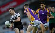 12 February 2022; Ceilum Docherty of Kilcoo in action against Cillian O'Shea, 6, and Craig Dias of Kilmacud Crokes during the AIB GAA Football All-Ireland Senior Club Championship Final match between Kilcoo, Down, and Kilmacud Crokes, Dublin, at Croke Park in Dublin. Photo by Piaras Ó Mídheach/Sportsfile