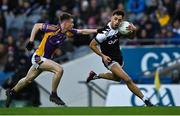 12 February 2022; Ryan Johnston of Kilcoo in action against Michael Mullin of Kilmacud Crokes during the AIB GAA Football All-Ireland Senior Club Championship Final match between Kilcoo, Down, and Kilmacud Crokes, Dublin, at Croke Park in Dublin. Photo by Piaras Ó Mídheach/Sportsfile