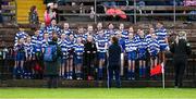 13 February 2022; Members of the St Pats Juvenile GAA Club have their photograph taken by Aoife Landers, before playing in the half time game during the LIDL Ladies National Football League Division 1B Round 1 match between Waterford and Dublin at Fraher Field in Dungarvan, Waterford. Photo by Ray McManus/Sportsfile