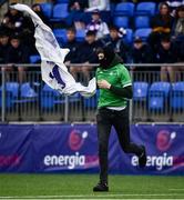 15 February 2022; A Gonzaga supporter takes a Clongowes flag at half time during the Bank of Ireland Leinster Rugby Schools Senior Cup 1st Round match between Clongowes Wood College, Kildare and Gonzaga College, Dublin at Energia Park in Dublin. Photo by David Fitzgerald/Sportsfile