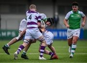 15 February 2022; Thomas Murphy of Gonzaga is tackled by James Ruddy, left, and Blayze Molloy of Clongowes Wood during the Bank of Ireland Leinster Rugby Schools Senior Cup 1st Round match between Clongowes Wood College, Kildare and Gonzaga College, Dublin at Energia Park in Dublin. Photo by David Fitzgerald/Sportsfile