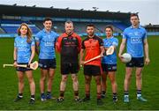15 February 2022; Balinteer hurlers Shane Corly, centre left, and Abood Al Jumali alongside Dublin players, from left, Aisling Maher, Eoghan O'Donnell, Dean Rock and Niamh Collins. Dublin GAA and AIG Insurance were in Parnell park to hold the official 2022 season launch and the rollout of the 2022 Equal campaign. Visit www.aig.ie/dublingaa for more information. Photo by David Fitzgerald/Sportsfile