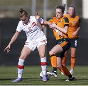 16 February 2022; Megan Connolly of Republic of Ireland in action against Nikola Karczewska of Poland during the Pinatar Cup match between Republic of Ireland and Poland at La Manga in Murcia, Spain. Photo by Silvestre Szpylma/Sportsfile