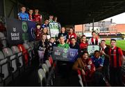 16 February 2022; Olympian Rob Heffernan and Peamount United footballer Stephanie Roche, centre, with, from left, Adam Feeney, Nikita Aleksandrovic, Francis Campbell, Bran Lambert, age 3, Susan Lambert, Harleigh Dempsey, age 4, Sean Brennan, Adam Lawson, age 3, Cillian Purcell, Jack Doyle, Kate Mooney, Leah O'Leary, Ciara Maher, Jimmy Dignan with daughter Madeleine, age 6 months, James Talbot, Chris Lotefa, Jack Moylan and Luke Dennison in attendance for the Bank of Ireland Healthy Football League launch at Dalymount Park in Dublin. Photo by David Fitzgerald/Sportsfile