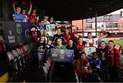 16 February 2022; Olympian Rob Heffernan and Peamount United footballer Stephanie Roche, centre, with, from left, Adam Feeney, Nikita Aleksandrovic, Francis Campbell, Bran Lambert, age 3, Susan Lambert, Harleigh Dempsey, age 4, Sean Brennan, Adam Lawson, age 3, Cillian Purcell, Jack Doyle, Kate Mooney, Leah O'Leary, Ciara Maher, Jimmy Dignan with daughter Madeleine, age 6 months, James Talbot, Chris Lotefa, Jack Moylan and Luke Dennison in attendance for the Bank of Ireland Healthy Football League launch at Dalymount Park in Dublin. Photo by David Fitzgerald/Sportsfile