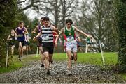 16 February 2022; Jack Martin of St Fergal's Rathdowney, right, and Kealan Gray of St Kieran's Kilkenny, competing in the intermediate boys' 4500m during the Irish Life Health Leinster Schools Cross Country Championships at Santry Demesne in Dublin. Photo by Sam Barnes/Sportsfile