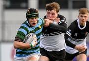 16 February 2022; Tim Wilkinson of St Gerard’s School is tackled by Finn Mahon of Newbridge College during the Bank of Ireland Leinster Rugby Schools Senior Cup 1st Round match between St Gerard's School, Dublin and Newbridge College, Kildare at Energia Park in Dublin. Photo by Harry Murphy/Sportsfile