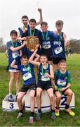16 February 2022; The Naas CBS team celebrate with the shield after winning the team event in the minor boys' 2000m during the Irish Life Health Leinster Schools Cross Country Championships at Santry Demesne in Dublin. Photo by Sam Barnes/Sportsfile