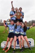16 February 2022; The Presentation Kilkenny team celebrate with the shield after winning the team event in the minor girls' 1500m during the Irish Life Health Leinster Schools Cross Country Championships at Santry Demesne in Dublin. Photo by Sam Barnes/Sportsfile