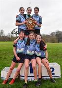 16 February 2022; The Presentation Kilkenny team celebrate with the shield after winning the team event in the minor girls' 1500m during the Irish Life Health Leinster Schools Cross Country Championships at Santry Demesne in Dublin. Photo by Sam Barnes/Sportsfile