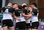 16 February 2022; Kieran Kelly of Newbridge College, centre, celebrates with teammates after scoring a try during the Bank of Ireland Leinster Rugby Schools Senior Cup 1st Round match between St Gerard's School, Dublin and Newbridge College, Kildare at Energia Park in Dublin. Photo by Harry Murphy/Sportsfile