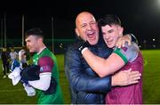 16 February 2022; Tomo Culhane of NUI Galway celebrates with his father, Mick, after victory in the Electric Ireland HE GAA Sigerson Cup Final match between NUI Galway and University of Limerick at IT Carlow in Carlow. Photo by Piaras Ó Mídheach/Sportsfile
